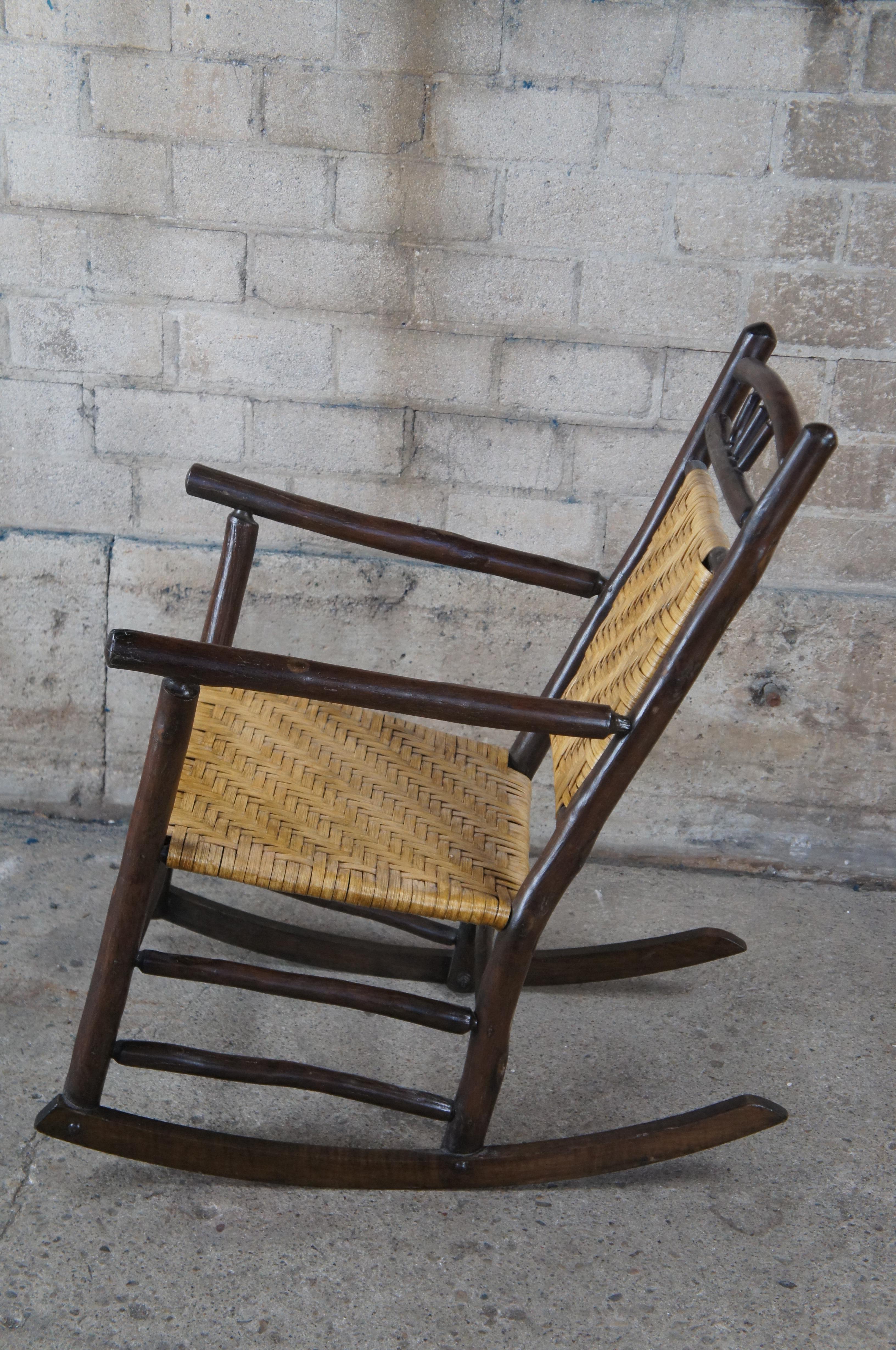 20th Century Antique Old Hickory Rocking Arm Chair Adirondack Wagon Wheel Back Lodge Rocker For Sale