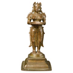 Figura femenina antigua de bronce indio en forma de lámpara de aceite