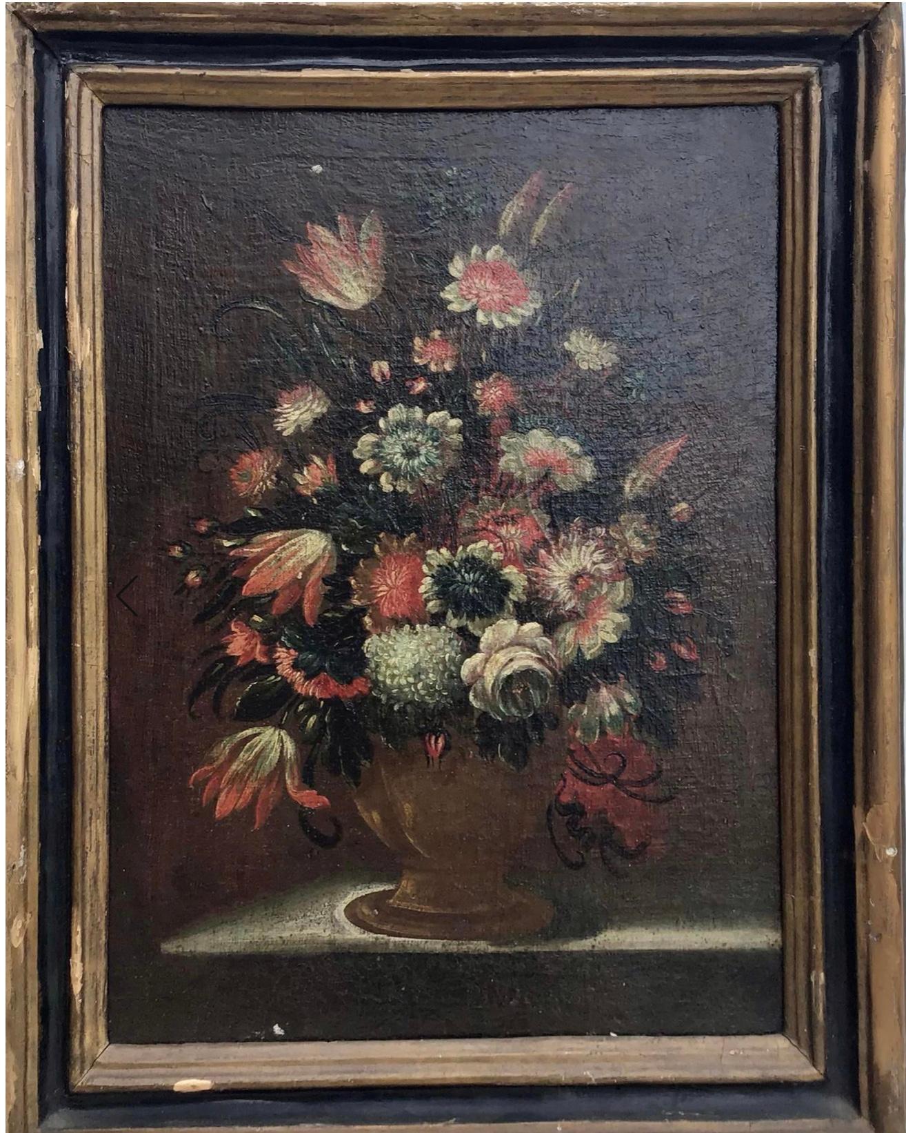 A Beautiful Italian Still Life oil painting on old canvas of a brass urn holding a bouquet of assorted flowers set on a ledge. 18th or 17th century. The painting is in good antique condition. Some spots of in painting and paint loss, craquelure, and