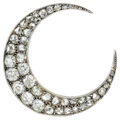 Broche antiguo de luna creciente con diamantes talla rosa y talla minera