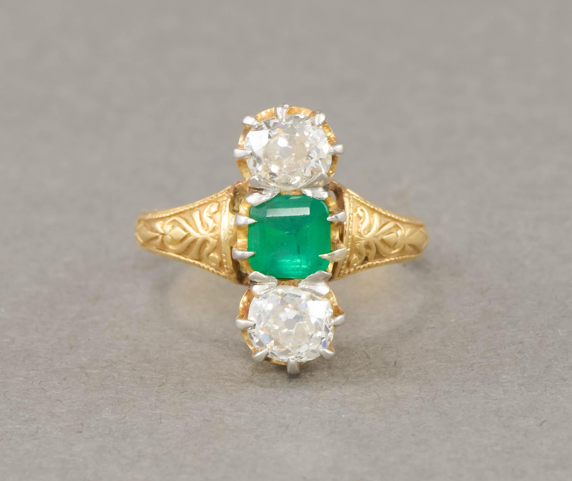 Far more beautiful than I can capture in my photos, this striking Victorian three stone ring features a rich, glowing 