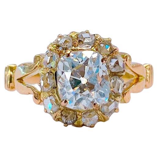 Antico anello solitario in oro con diamante taglio miniera