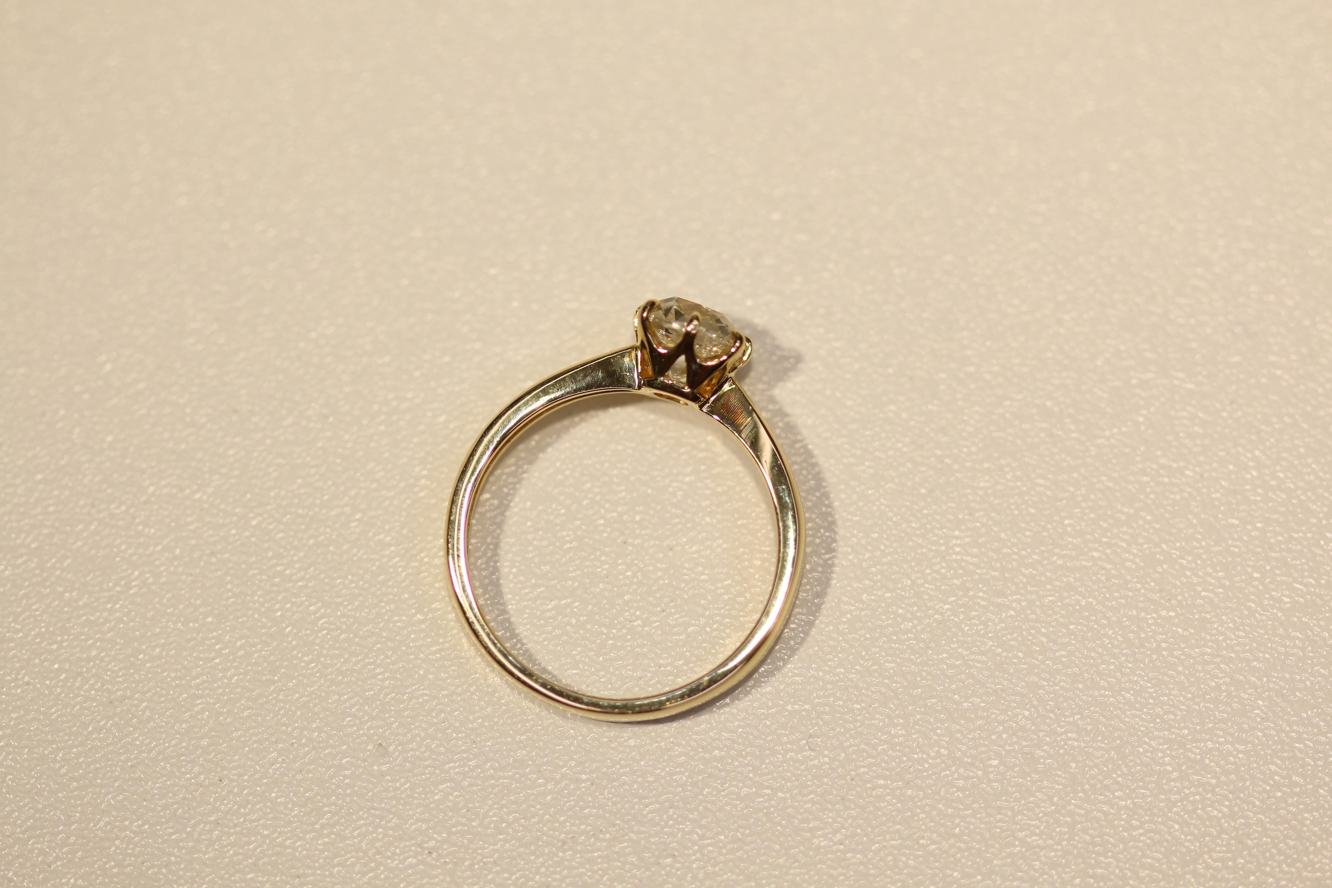 Women's Antique Old Mine Cut Diamond on a Gold Solitaire Ring