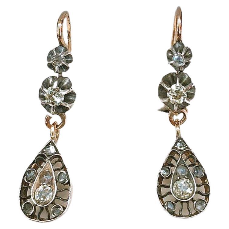 Antique imperial russian era 1907/1917.c 14k gold earrings with old mine cut diamonds in silver prongs with an estimate diamond weight of 0.50 ct hall marked 56 imperial russian gold standard and initial maker mark in cyrllic alphabet