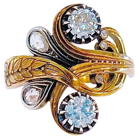Antique 14k gold Russian old mine cut diamond ring with an estimate 2 old cut diamond weight of 1 carat with white inclusion included in 1 stone flanked with 2 rose cut diamonds with an estimate weight of 0.50 carats ring is hall marked 56 Russian