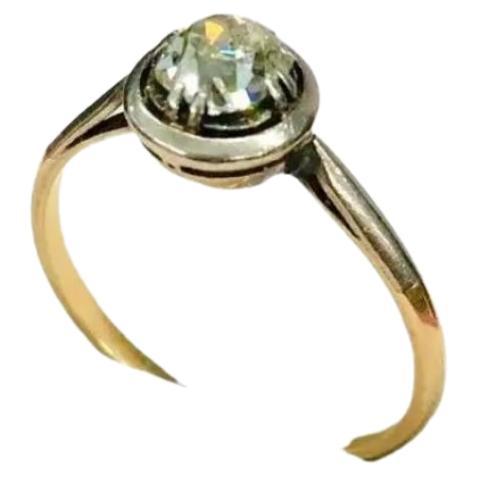Antique 14k gold diamond ring in solitaire style centered with old mine cut diamond estimate weight of 0.50 carats ring was made in moscow during the early soviet union era 1917/1920s hall marked 583 gold standard and moscow assay mark and initial