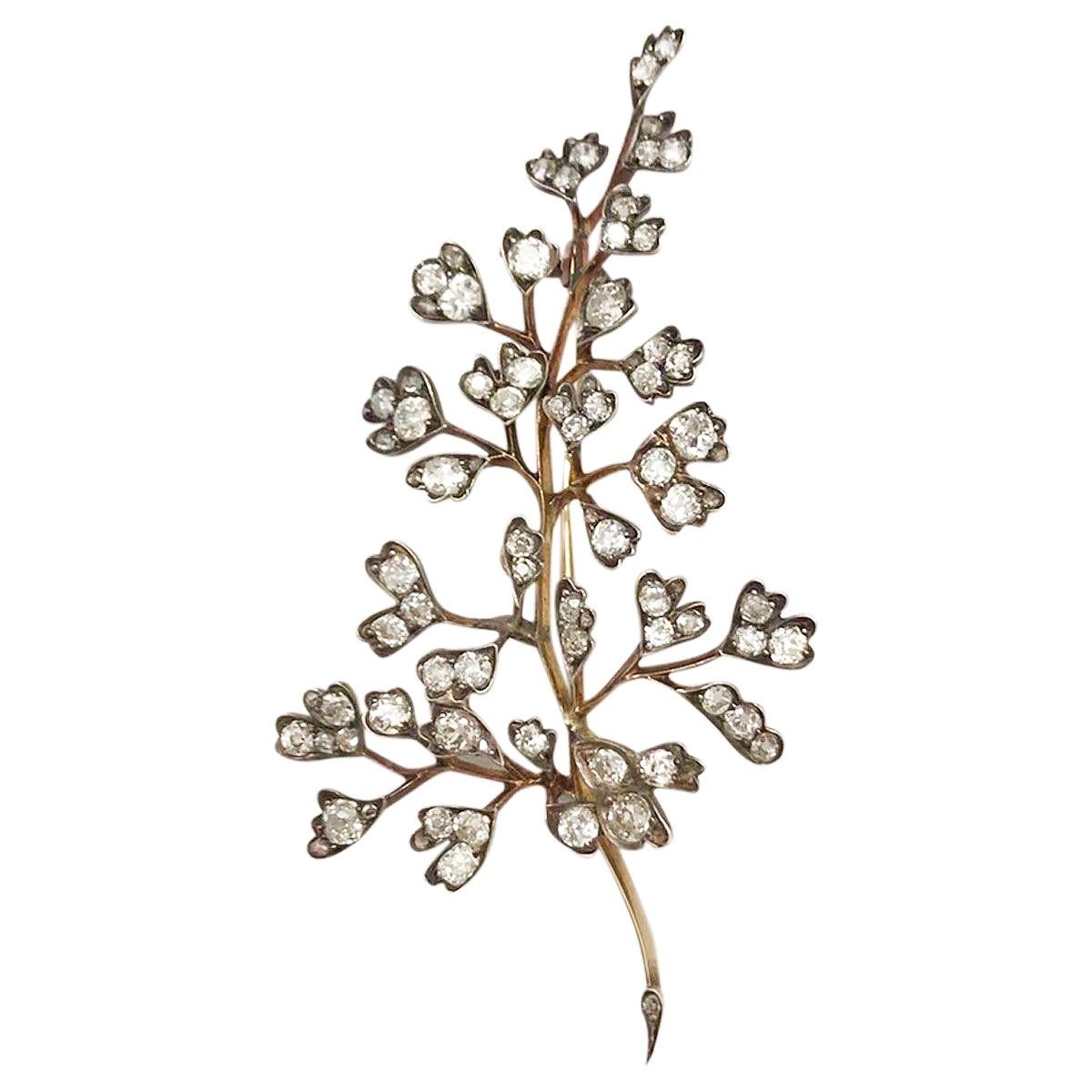 This pin is just so elegant and sophisticated, finely made and delicate this special piece can be added to any outfit to make it something classic and stylish. Crafted in silver over gold indicative of the era, its fern like structure showcases