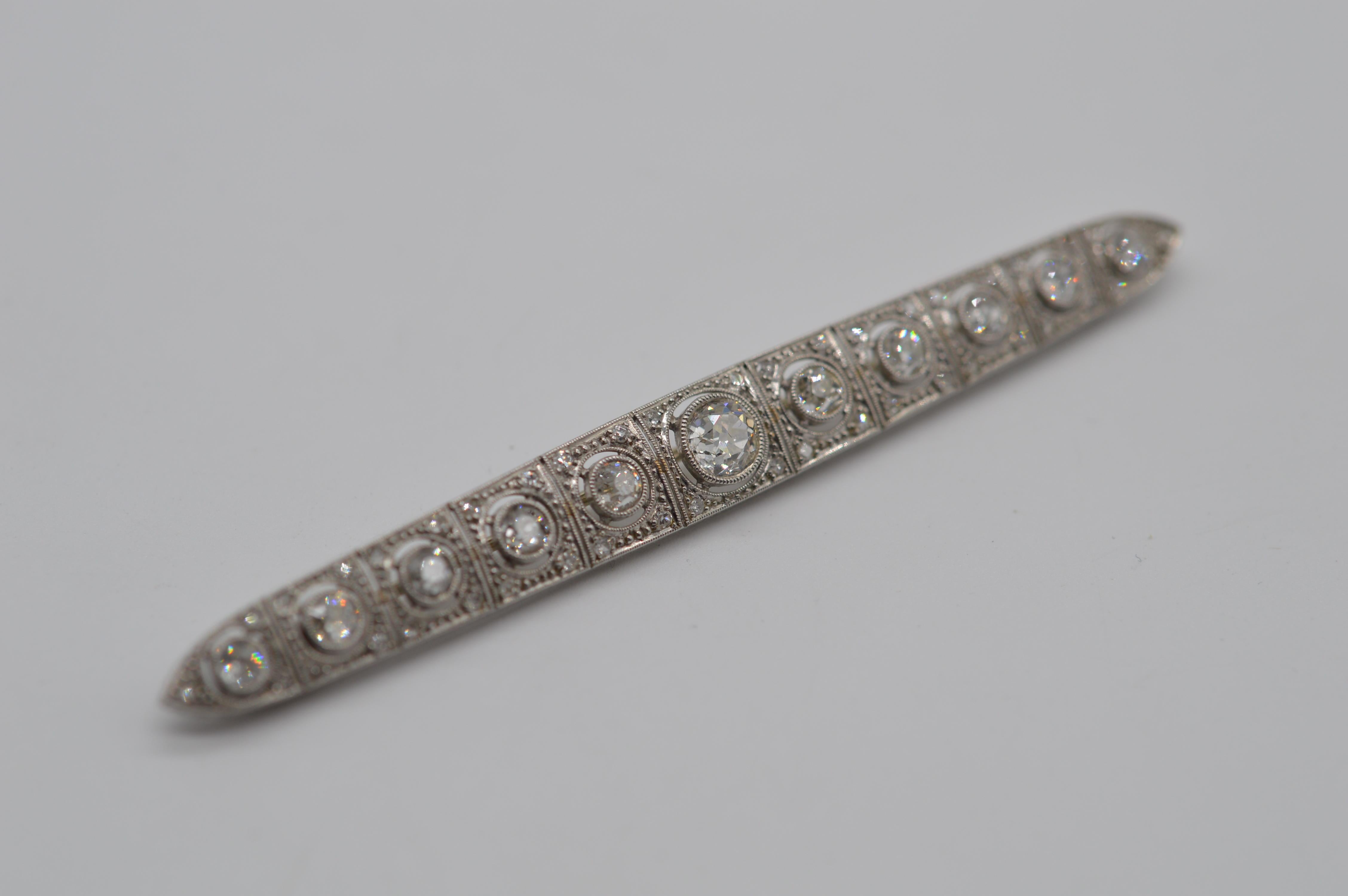 Antique & Elegant Platinum Diamond Brooch Bar-Pin
Features 11 Large Old Mine Cut Diamond & 42 small 