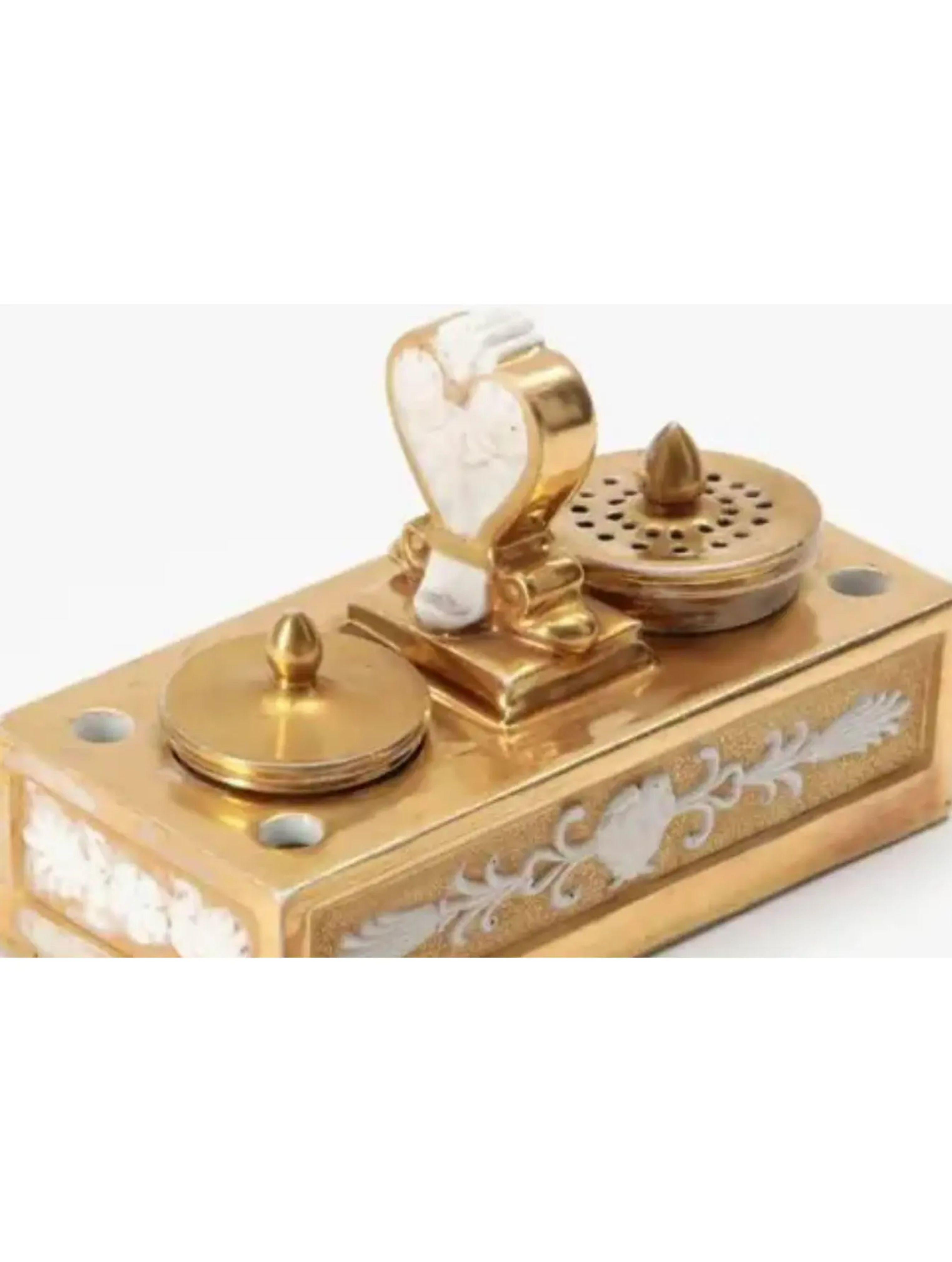 Antique early 19C Old Paris Porcelain Inkwell

Additional information: 
Materials: Porcelain
Color: Gold
Brand: Old Paris
Designer: Old Paris
Period: Early 19th Century
Place of Origin: France
Styles: Louis XVI
Item Type: Vintage, Antique