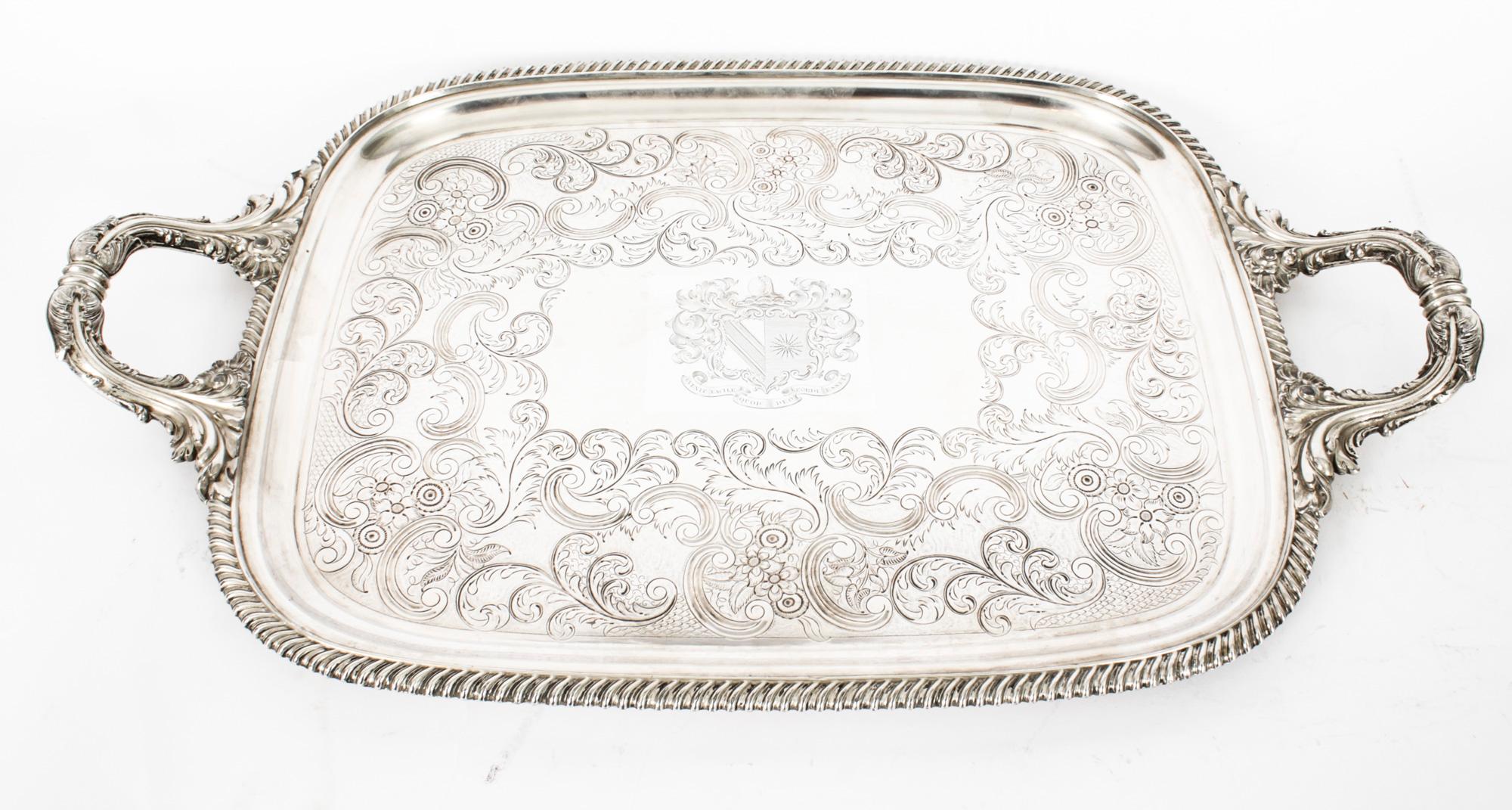 This is a superb antique English Old Sheffield Silver Plate tray Circa 1780 in date.

This rectangular Old Shefield tray features a deep set, decorative gadrooned border with elegant handles decorated with acanthus leaves to each end, superb foliate