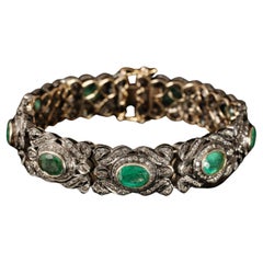 Bracelet ancien de la belle époque en émeraudes et diamants