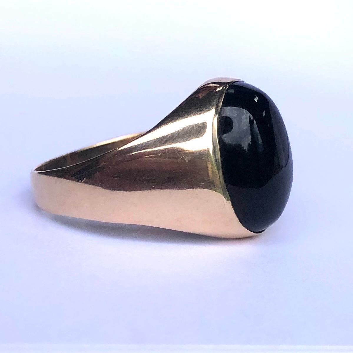 The large onyx cabochon stone in this ring is so glossy and beautiful and complimented buy the 9ct yellow gold. 

Ring Size: X or 11 1/2 
Stone Dimensions: 16x11mm 
Height Off Finger: 7mm

Weight: 7.3g