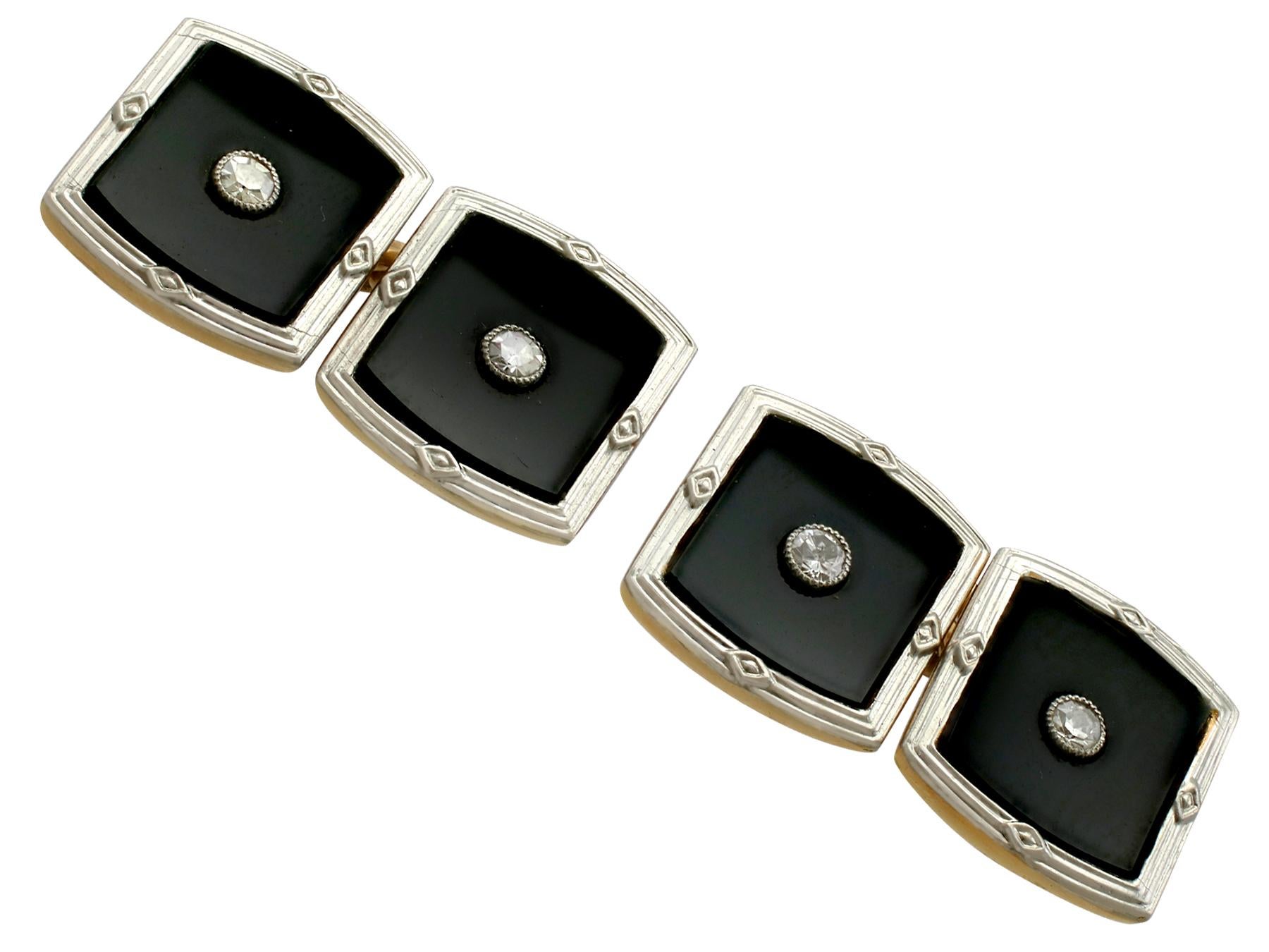 A fine and impressive pair of antique black onyx and 0.16 carat diamond, 18 karat yellow gold, platinum set cufflinks; part of our antique jewelry and estate jewelry collections.

These fine and impressive antique onyx cufflinks have been crafted in