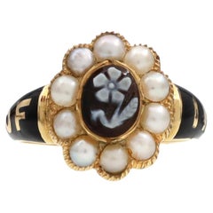 Antique onyx flower cameo, pearl and black enamel memorial ring in 18kt gold