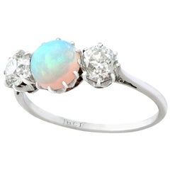 Antique Opal and 1.08 Carat Diamond Gold Trilogy Ring, circa 1920