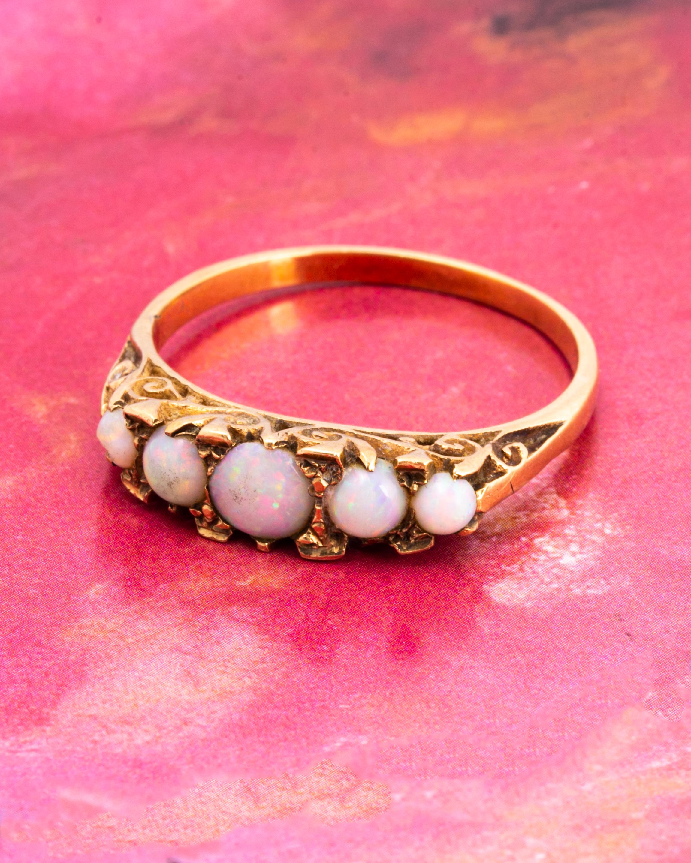 Cabochon Antique Opal and 18 Carat Gold Five-Stone Ring For Sale