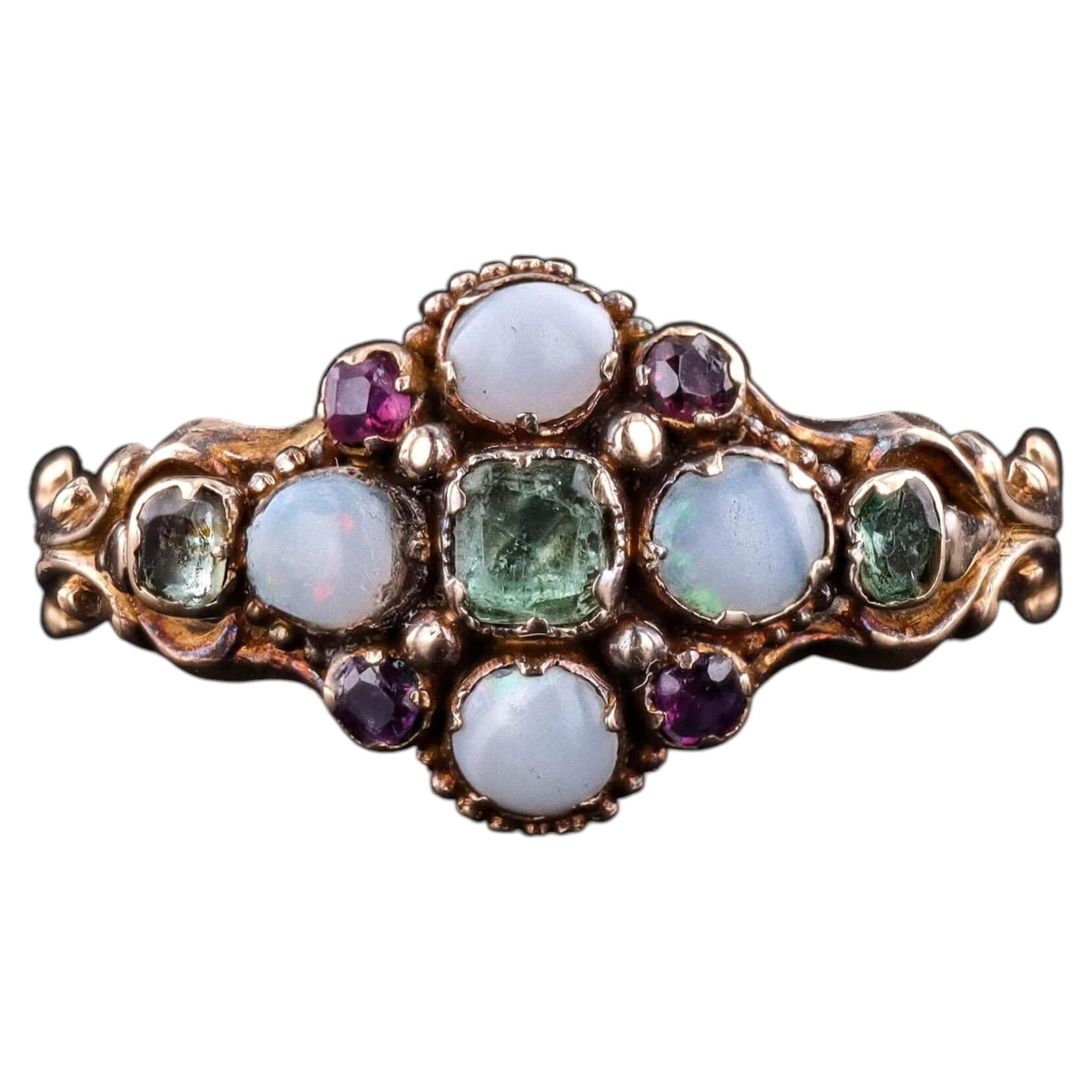 Antique Opal, Emerald, and Ruby Ring of 15k Gold, Circa 1850