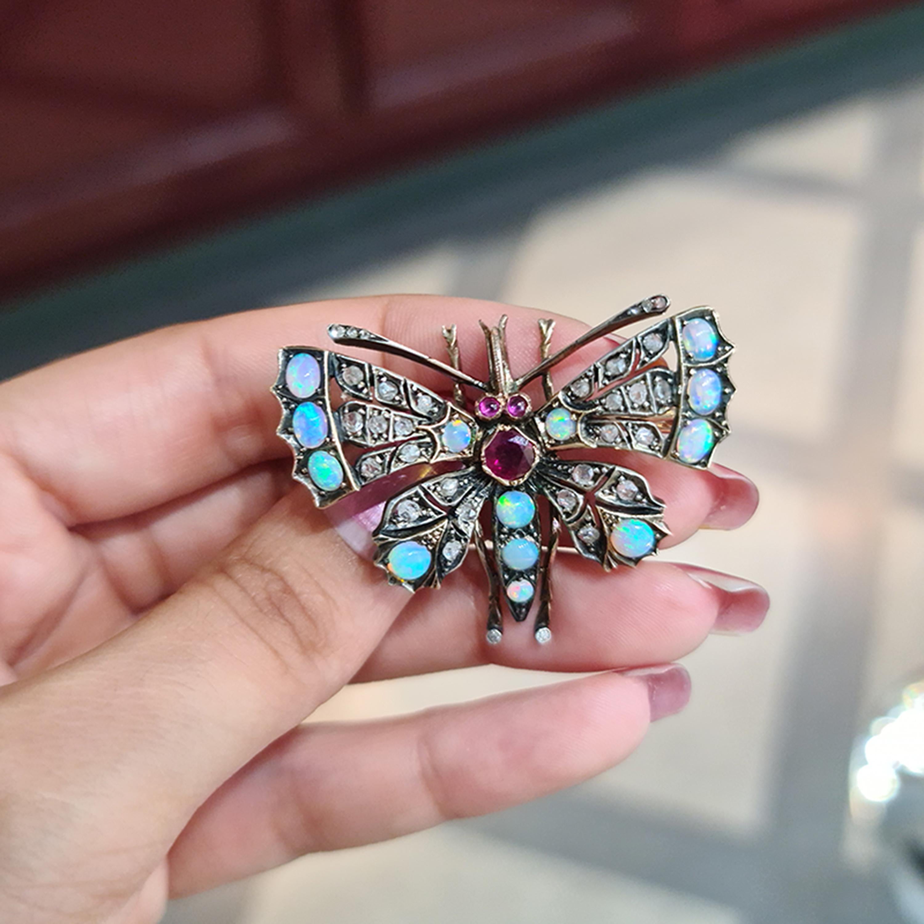 Cabochon Antique Opal, Ruby and Diamond Butterfly Brooch, Circa 1890 For Sale