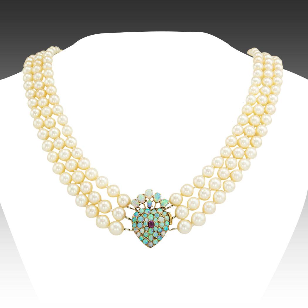 Antique ruby opals cultured pearls and yellow gold three-strand nested necklace circa 1900. *

ABOUT THIS ITEM:  #N-JD817B. Scroll down for specifications.  The overflowing heart-shaped clasp is a showstopper.  Those opals display a kaleidoscope of