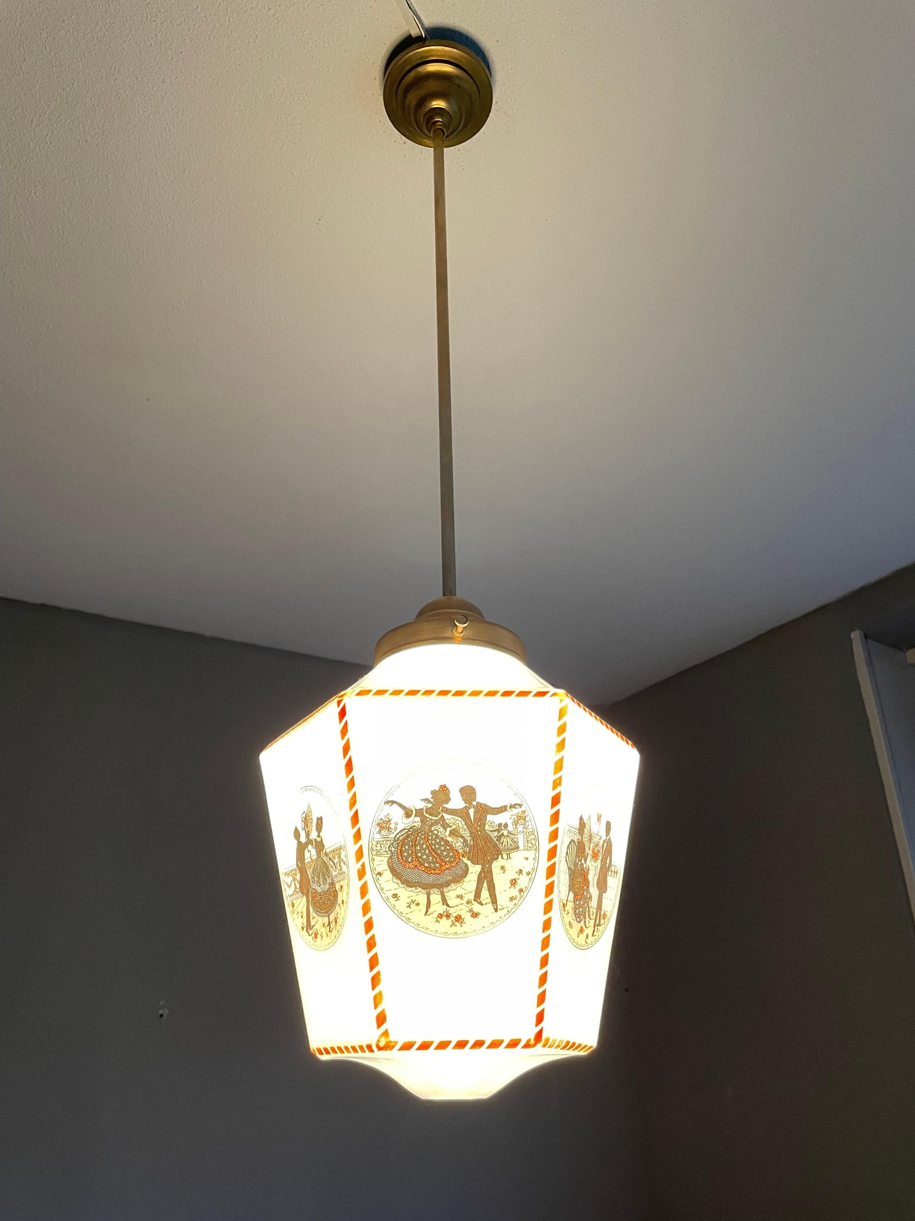 Hexagonal design, early 1900s pendant with colorful, silhouette style Victorian graphics.

If you are looking for a rare, beautifully designed and finely decorated pendant to grace your entrance, landing or perhaps your bedroom then this Victorian