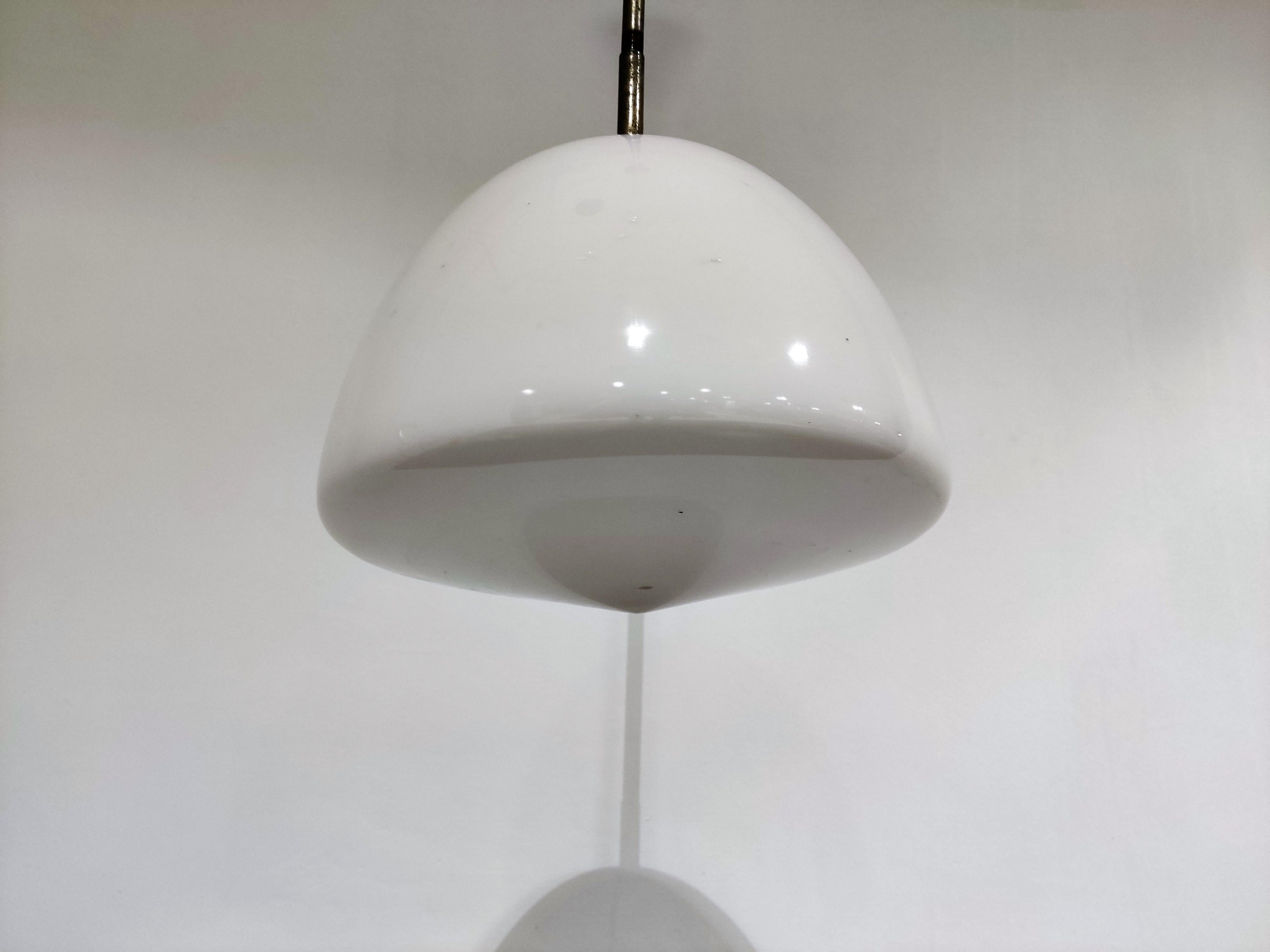 Antique Art Deco hallway pendant lights.

These lamps are very typical for the Art Deco era and were widely used to be hung in hallways, offices or larger public places.

The lamps have the original shade holders and ceiling caps.

The shade