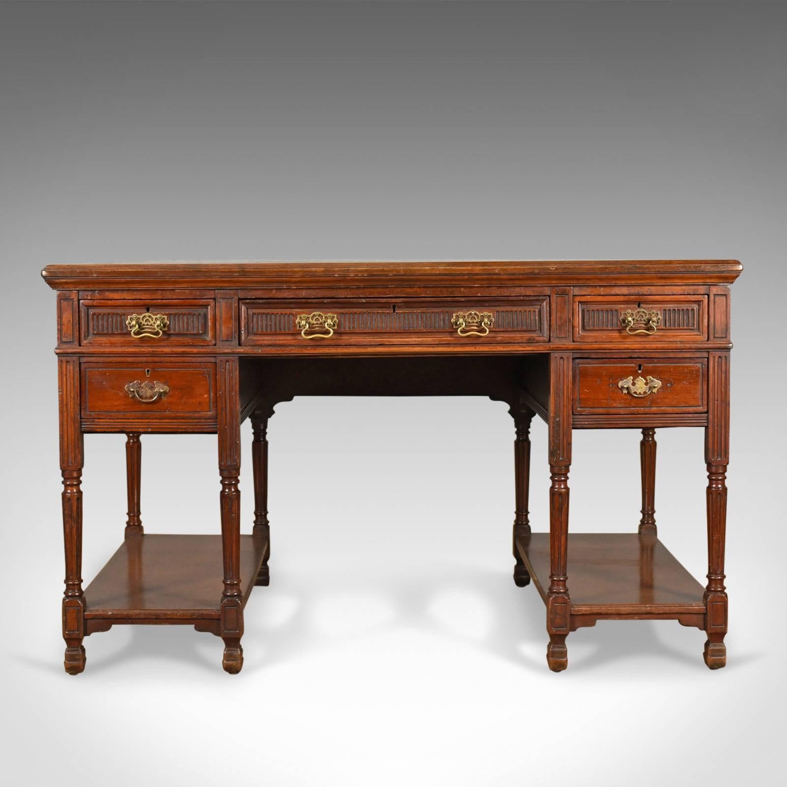 This is an antique open pedestal desk, an English, walnut writing table by W. Walker and Sons, London and dating to the late 19th century, circa 1870.

Attractive desk in select walnut displaying mellow tones
Made by the pre-eminent cabinet maker