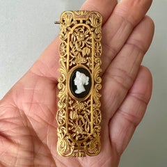 Antique Openwork Gold-Gilt Arabesque Buckle with Onyx Cameo, 19th Century