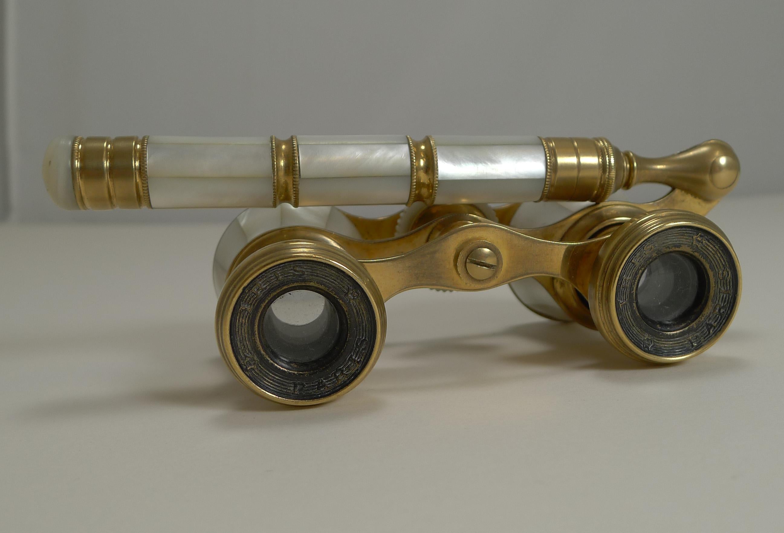 A stunning pair of late Victorian or Edwardian Opera glasses dating to the turn of the century, circa 1900. French in origin, each eye piece is signed, Iris, Paris. The underside of the frame is also marked for Iris (
