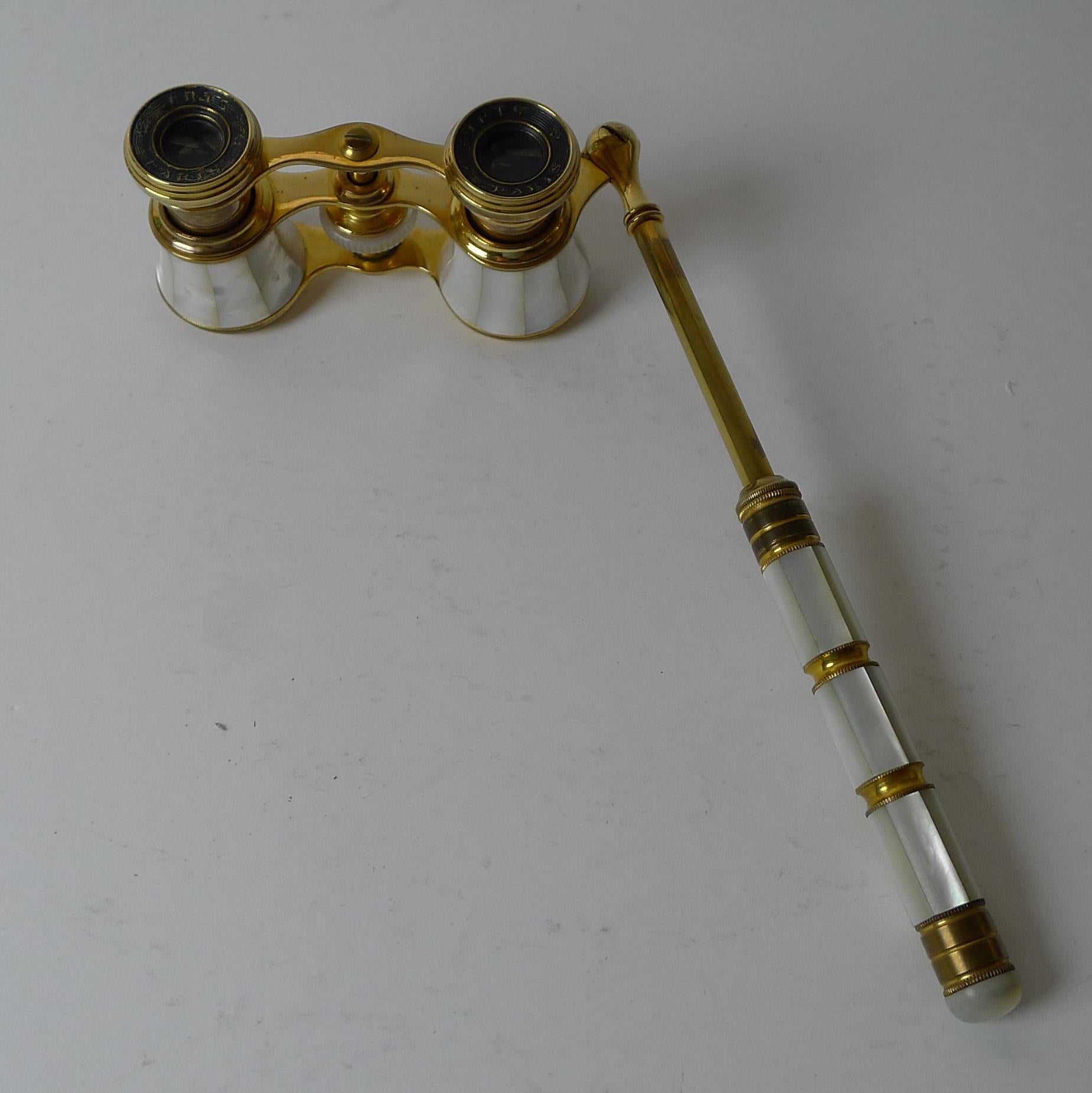 A stunning pair of late Victorian or Edwardian Opera glasses dating to the turn of the century, around 1900. French in origin, each eye piece is signed, Iris, Paris together with the mark for Iris (