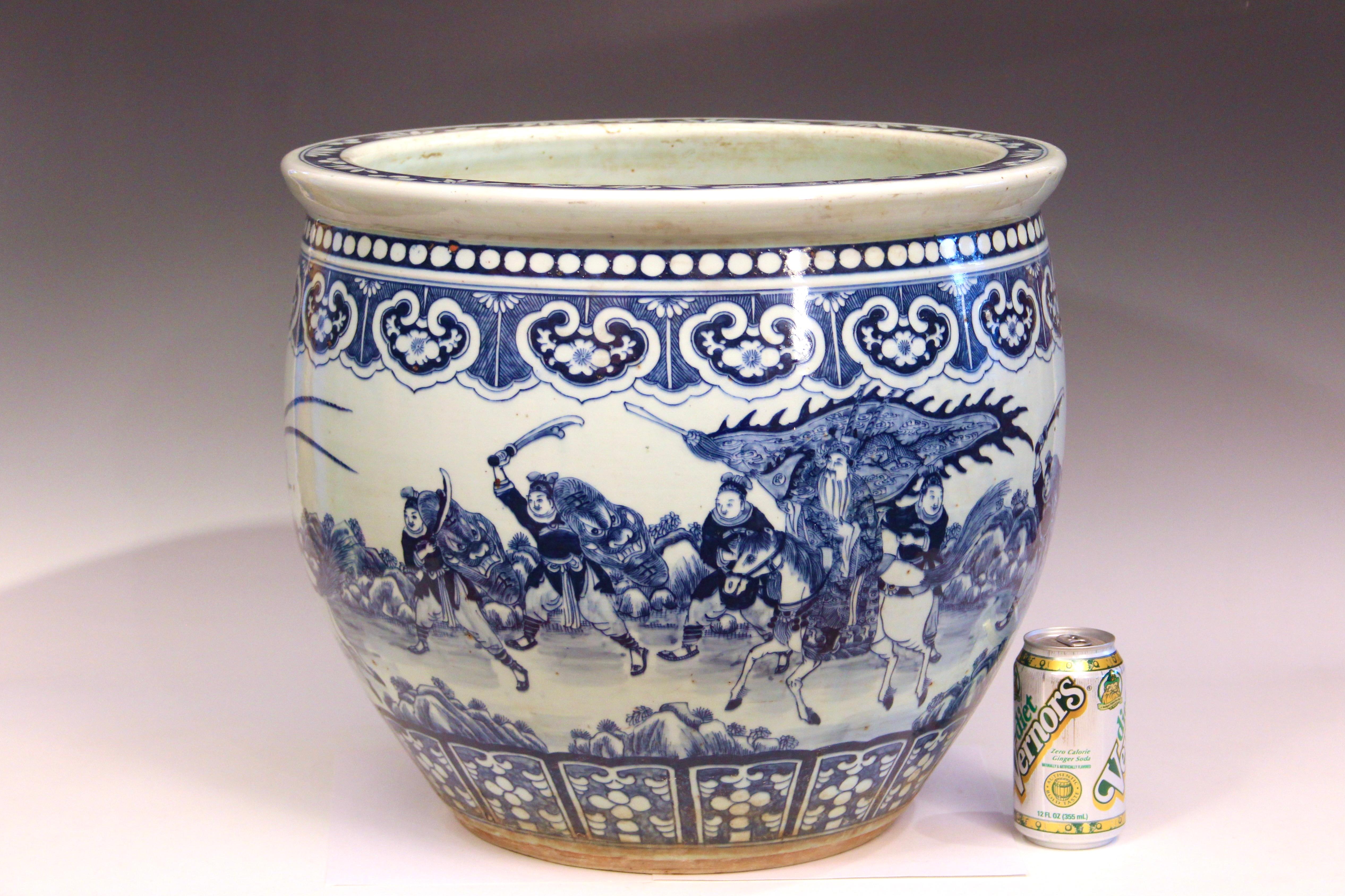 Old or Antique Chinese porcelain blue and white jardiniere with extraordinary processional decoration, circa early/mid 20th century. Great color and crisp detail. Excellent condition. 18