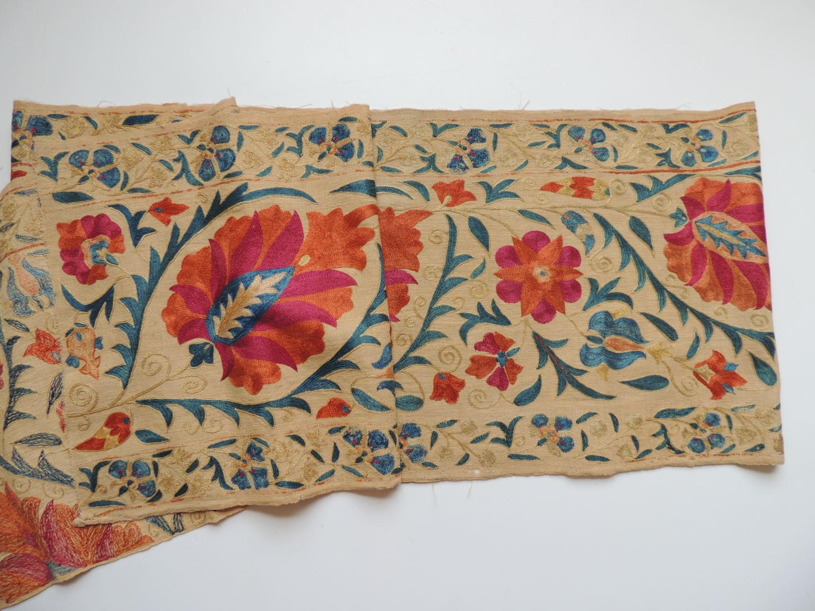 Antique orange and blue long Suzani table Runner.
Large and small embroidered flowers in shades of orange, green, blue, aqua,
turquoise, yellow and natural.
Silk embroidered on linen.
Size: 12