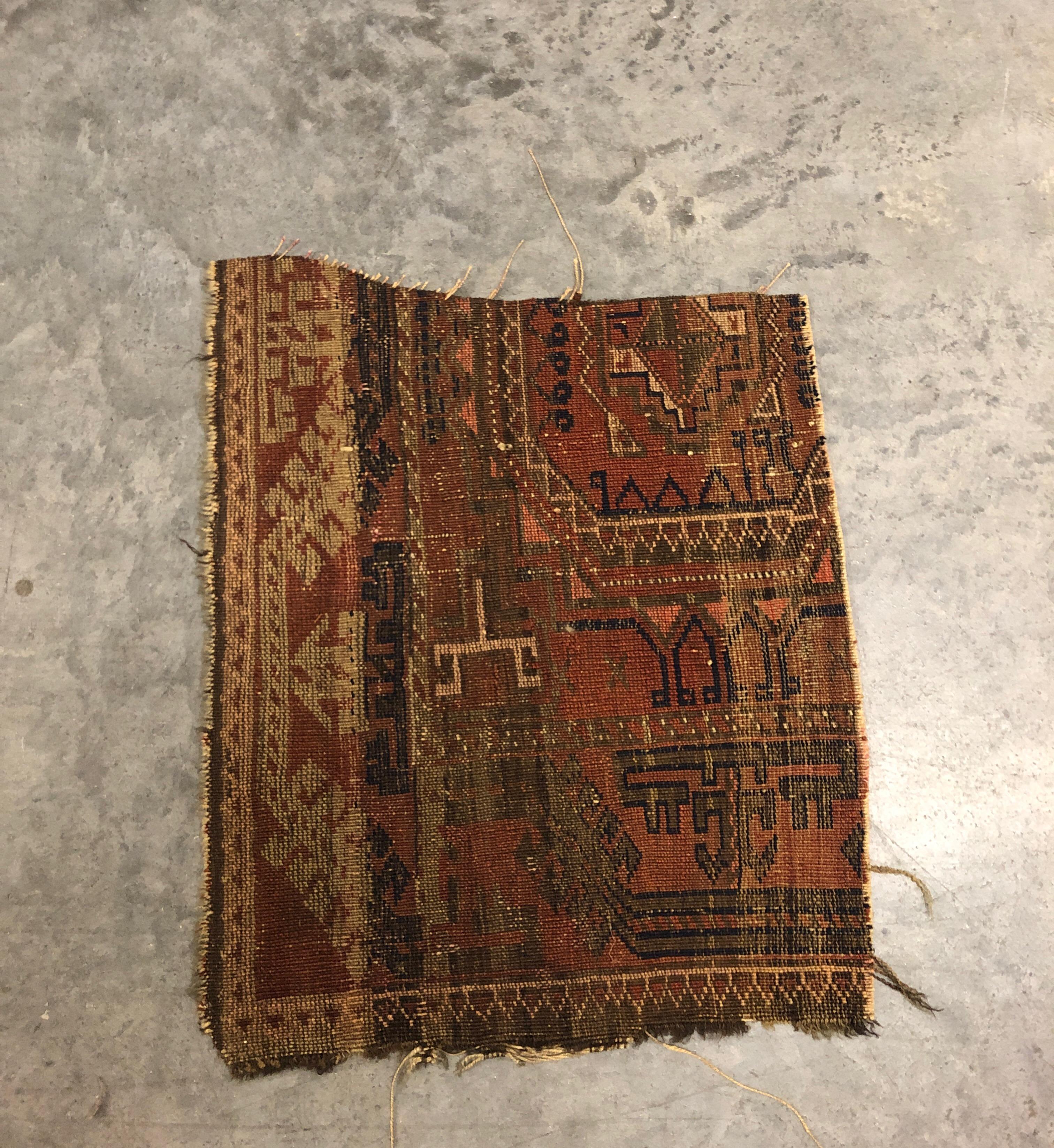 Antique orange and blue Persian rug fragment.
Ideal for a pillow or to upholster a small footstool.
Size: 18