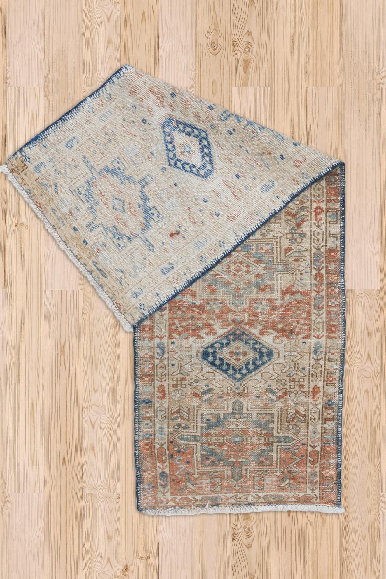 Age: Circa 1930

Colors: ivory, cerulean blue, ginger, soft scarlet red

Pile: low

Wear Notes: 5

Material: Wool on Cotton. 


Woven in the early 20th century, this antique Persian Karaja features the highly recognizable Karaja symbols of crabs and