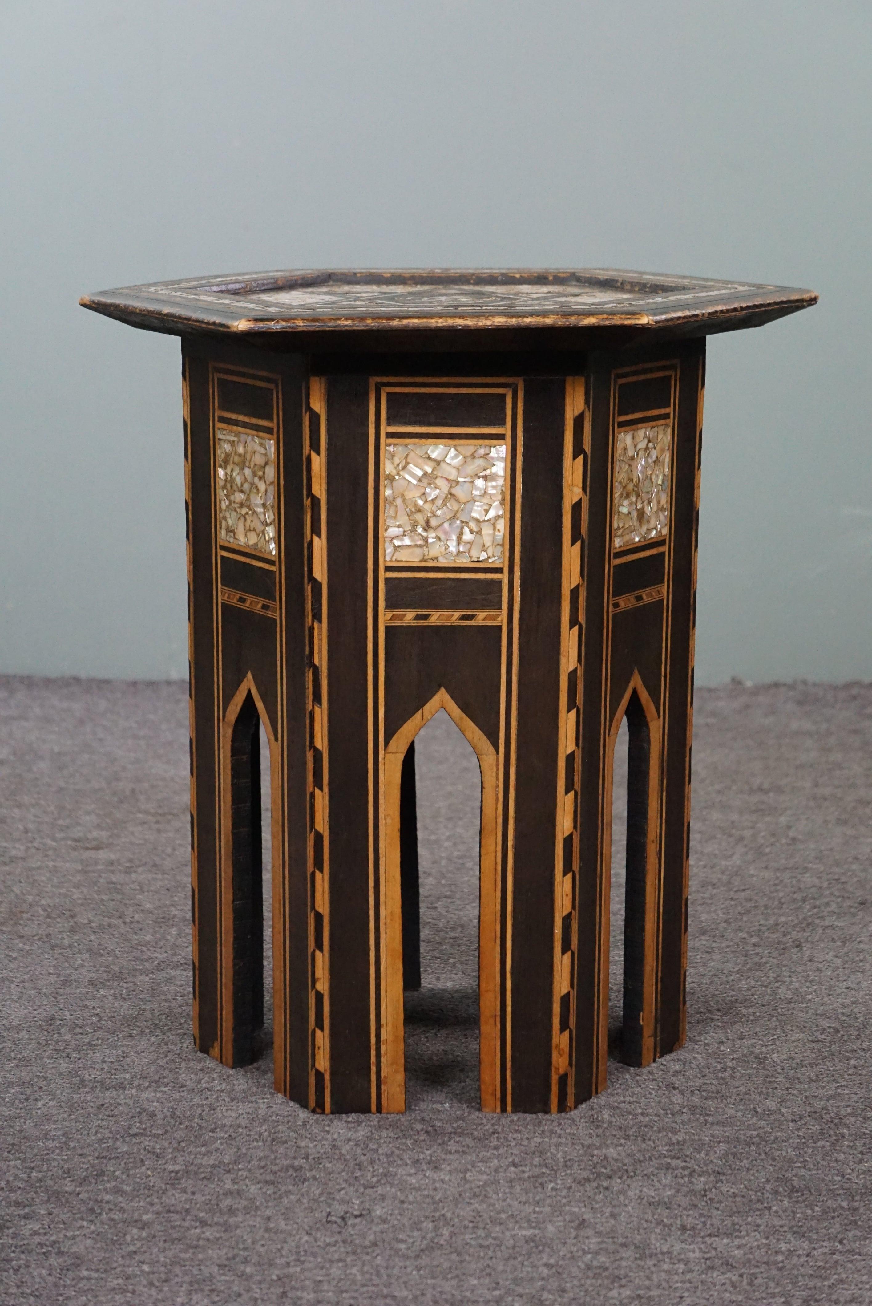With pride we offer you this Oriental side table featuring a unique mosaic pattern. Discover this beautiful antique and unique Oriental pearl mosaic side table! With genuine joy, we offer this extraordinary masterpiece for sale. This stunning table