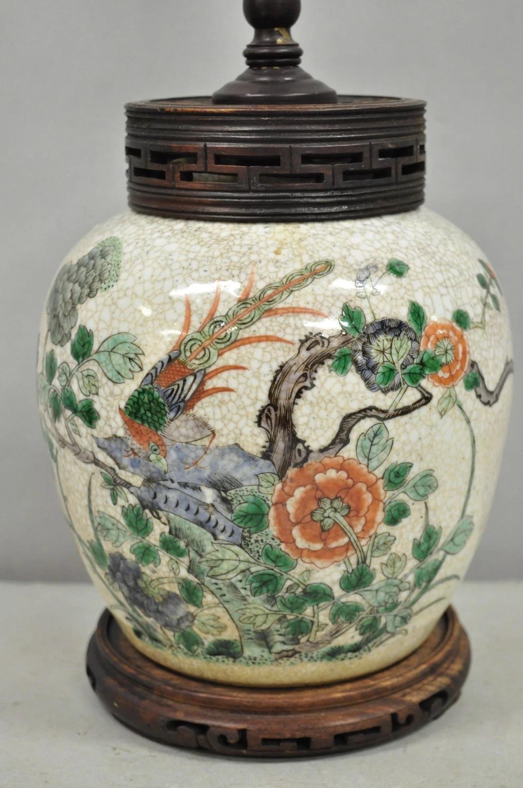 Antique Oriental Porcelain Bulbous Vase Bird Painted Table Lamp w/ Solid Wood Carved Mounts and Shade. Circa Early 20th Century. Measurements: 24
