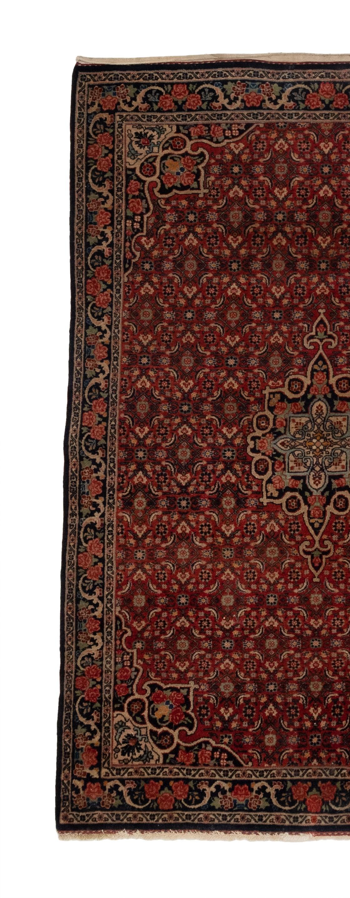 This antique Oriental rug from the 1880s boasts a stunning floral design on an ivory field. The intricate patterns and flawless craftsmanship highlight the incredible skill and creativity that went into making it. Its timeless beauty and exquisite