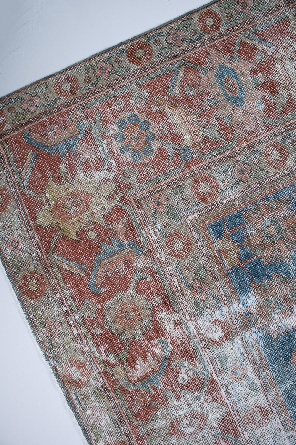 Early 20th Century Room Size Distressed Persian Sarouk Rug For Sale