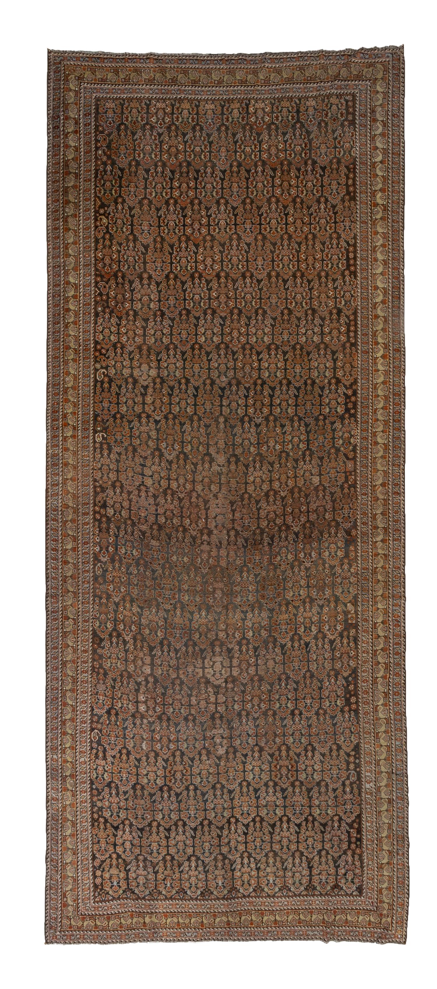 Age: Circa 1910

Colors: kohl black, umber, taupe, russet brown, oxblood

Pile: low, original

Wear Notes: 2

Material: Wool on wool. 

Gorgeous tribal antique Persian Shiraz rug woven in the early 1900's. Deep kohl black field filled with repeating