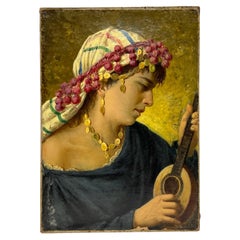 Antico dipinto a olio orientalista raffigurante una donna che suona uno strumento a corda