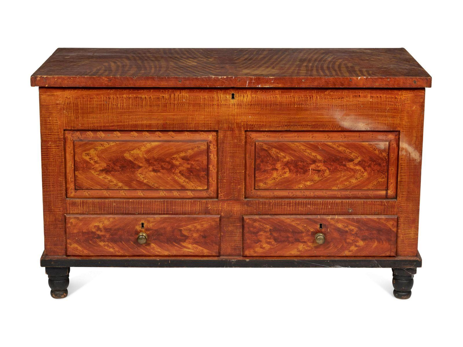 Exceptional and rare 19th century New England or Pennsylvania Poplar blanket chest with original faux grain paint. Paint has a lovely warm tone and overall condition is good. Chest has original hardware. Hinges are tight. 

Dimensions
27