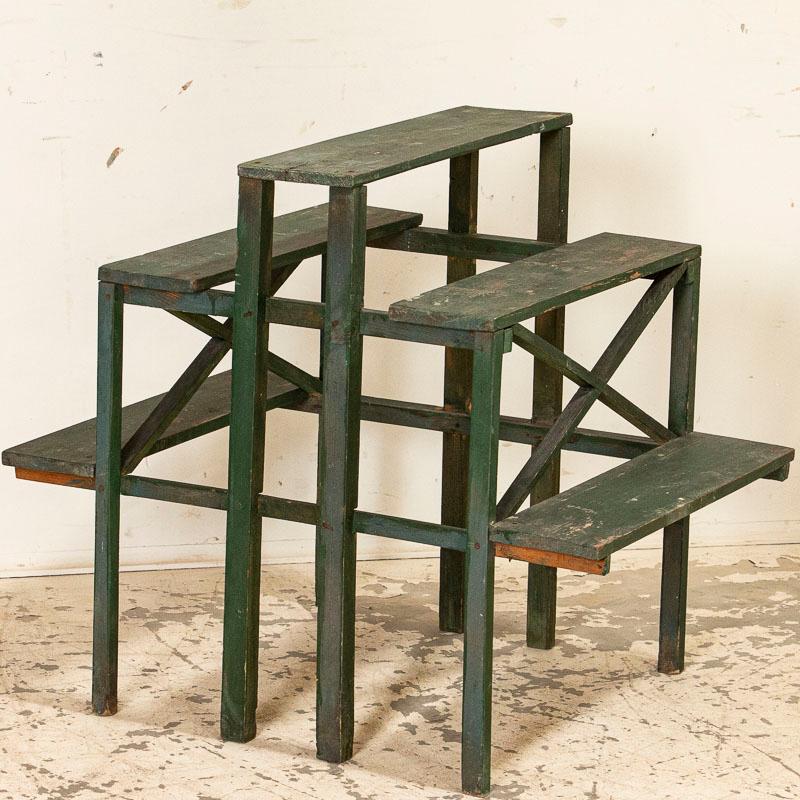 Country charm exudes from this delightful plant stand from Sweden. The green paint is all original, and the 5 