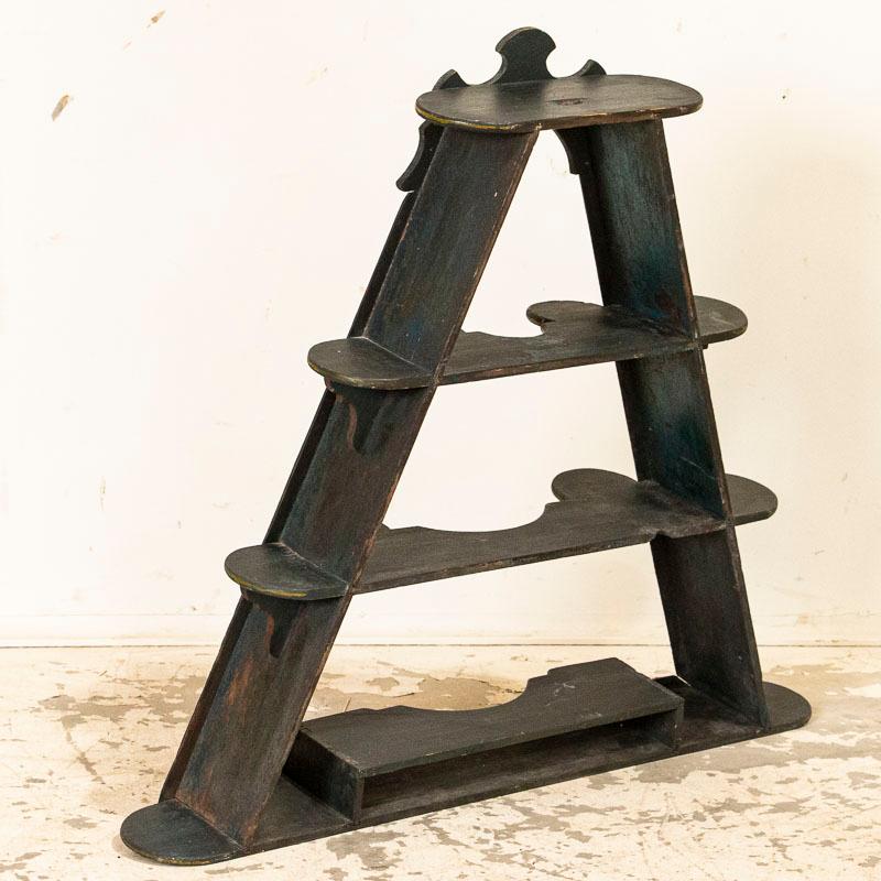 The unique triangular shape of this hanging rack is quite traditional and known in the 1800s of Denmark as a 