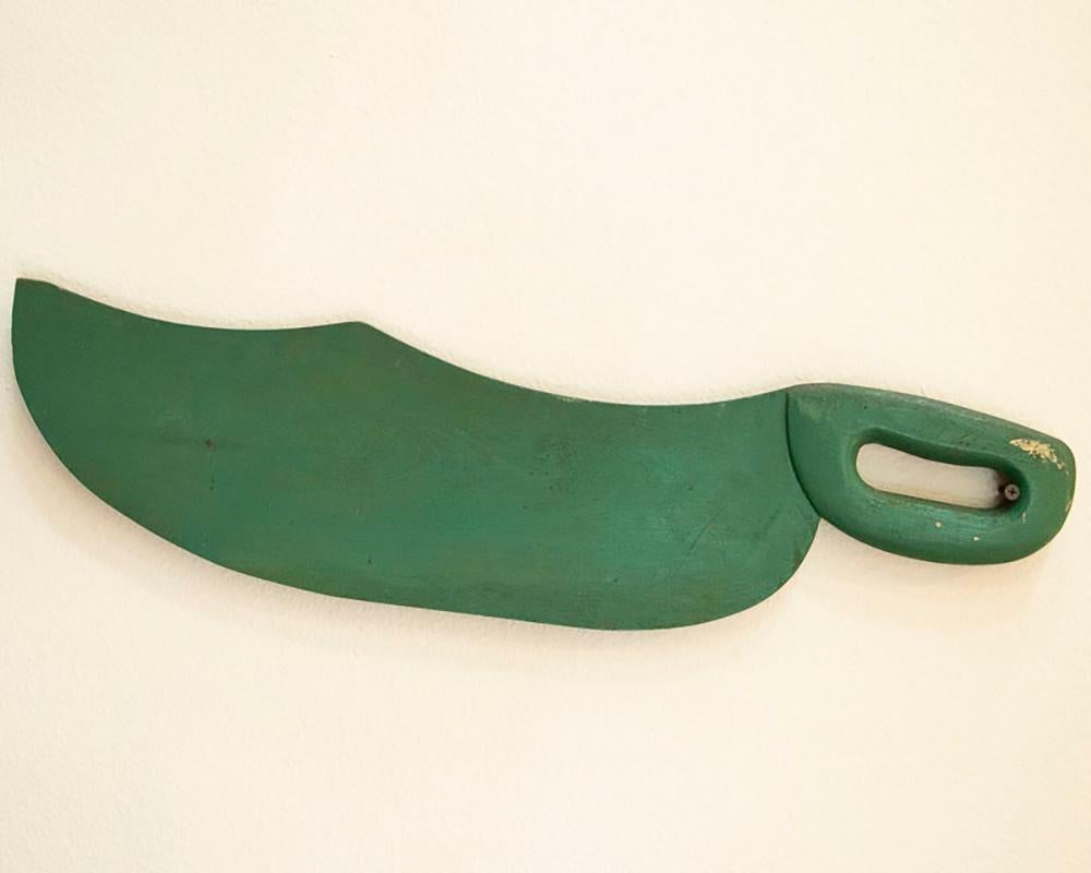 Antique original green painted Swedish farm tool with simplistic hand-painted depiction of farmers in the process of scutching flax. This Swedish hand-carved scutching knife was used during the flax harvest season, but the hand-painted details