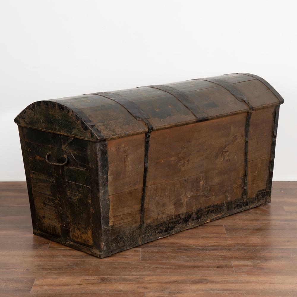 antique round top trunk