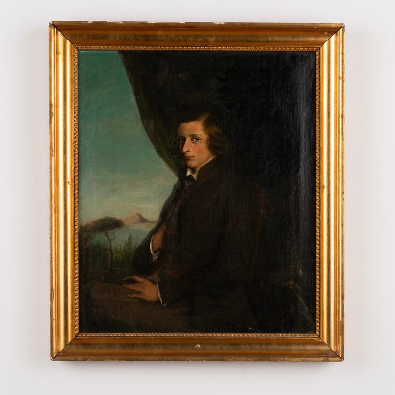 Portrait of a young man, attributed to Carl Wagner (1796-1857). This original oil on canvas portrait of a young gentleman with a cigar reveals Mount Vesuvius in the background. On the back it is labeled 
