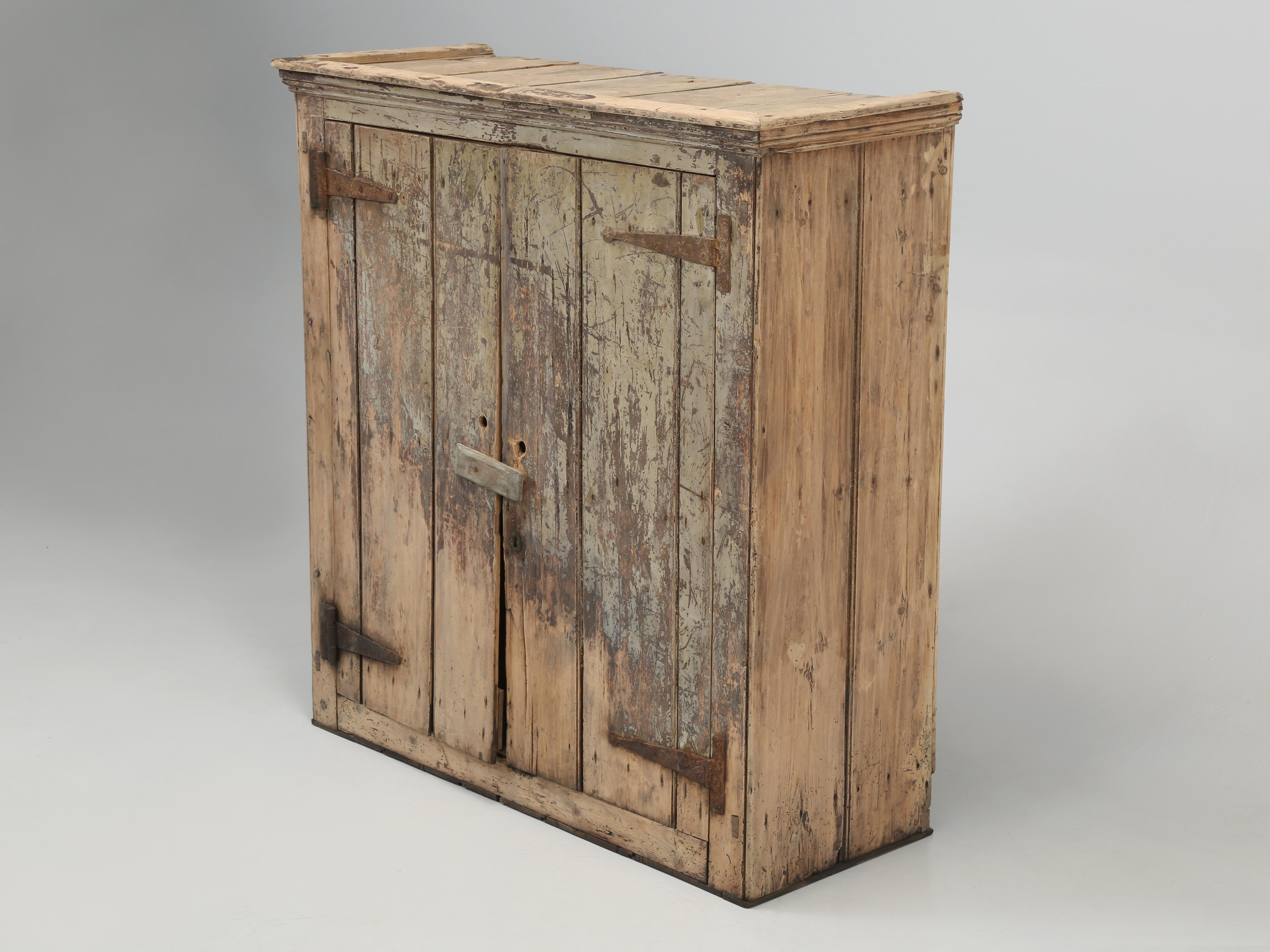 Wonderful “Shabby Chic” rustic antique 2-door small cupboard, still wearing its Original Painted Finish from the 1800s. The Small Painted Cupboard was found in Ireland and after some cleaning and tightening she’s ready for a new home. The