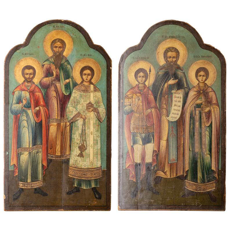 Pair, original painted Russian icons on wood. 
Portrayal of Saint George, Saint Simon and Saint Aviva
Age related crackles, dings/scratches, scuffs/nicks to edges, etc
Moscow School, 18th century
Please refer to professional photos for clear