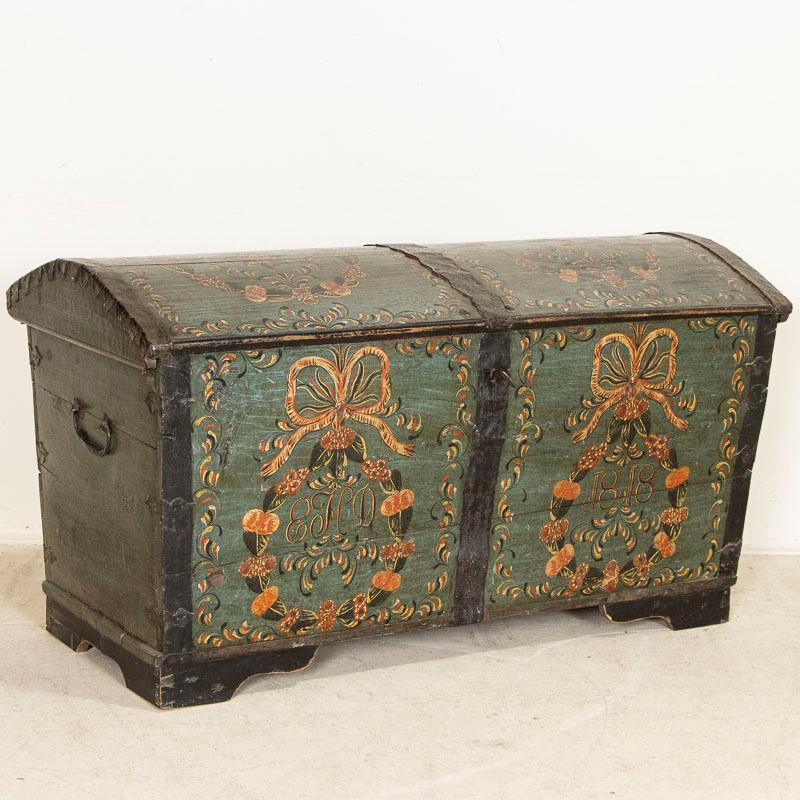 Traditional Swedish Folk Art painting is a unique, hand-painted treasure and this highly decorative domed top trunk is a perfect example of Swedish country craftsmanship. The paint is all original, and gently distressed over many years of use.