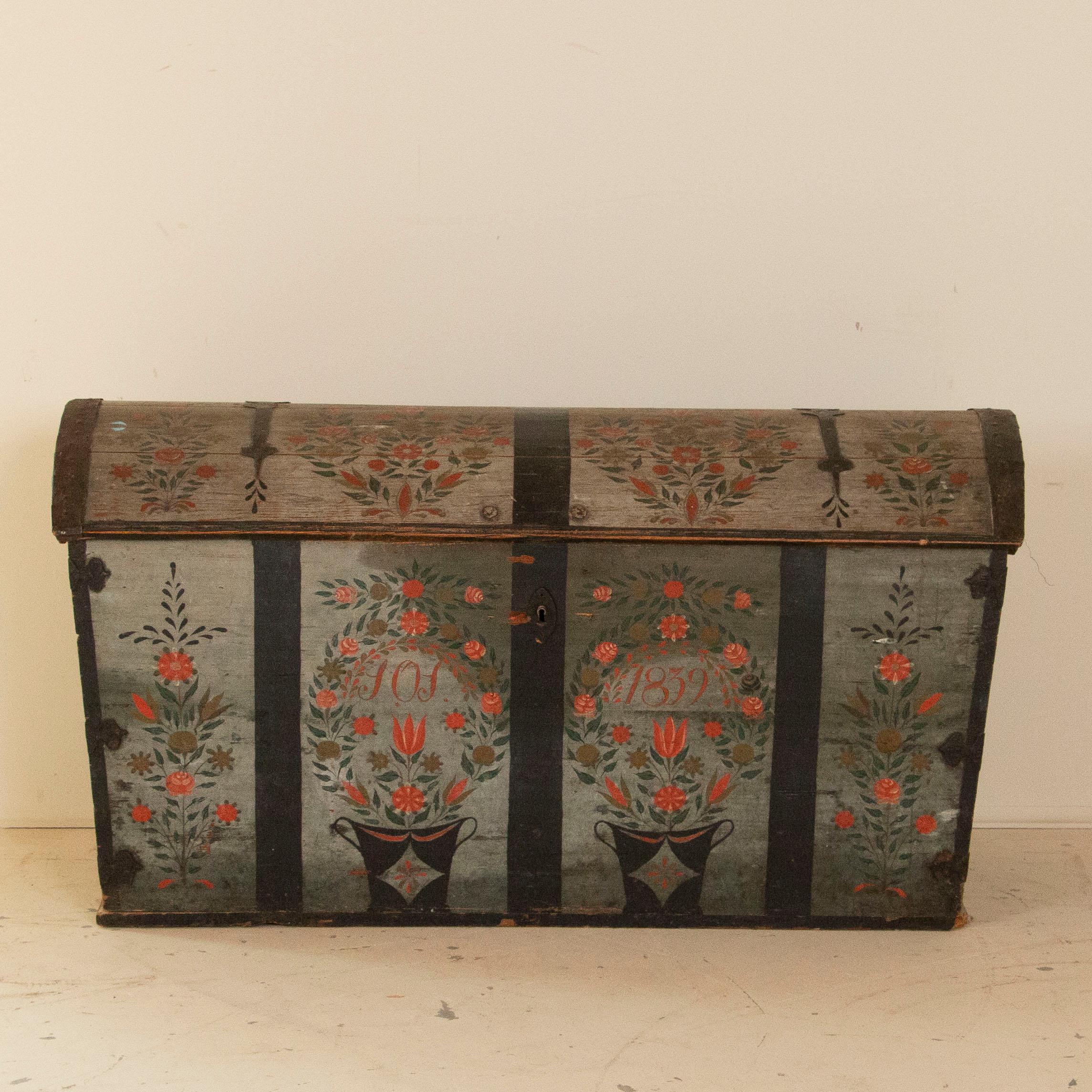 Traditional Swedish Folk Art painting is a unique, hand painted treasure and this wonderful domed top trunk is a perfect example of Swedish country craftsmanship. The paint is all original, and gently distressed over many years of use. Notice the