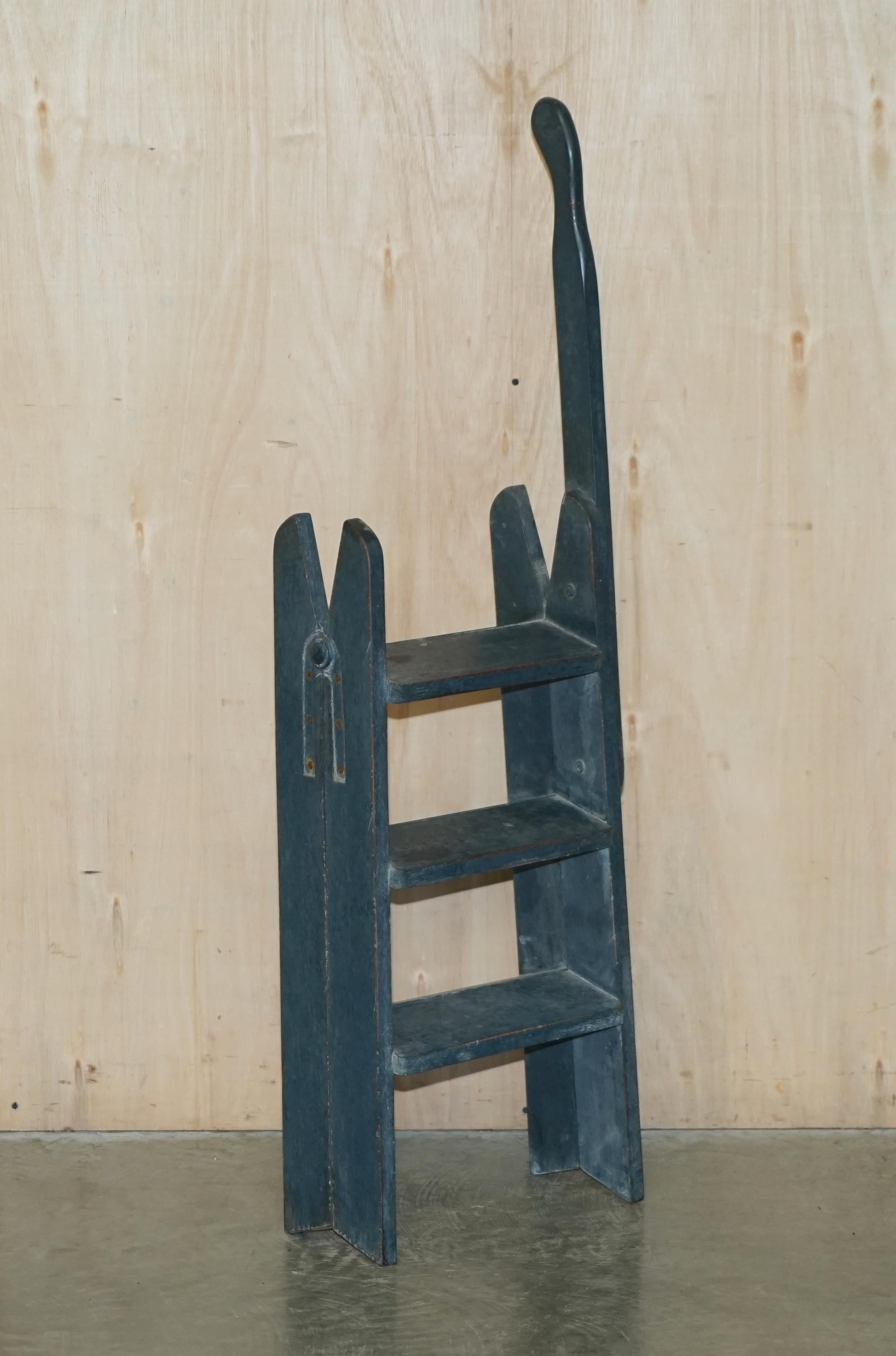 Royal House Antiques

Royal House Antiques is delighted to offer for sale this lovely original pine library steps or ladder to sit next to a bookcase

A good looking and decorative piece with a lovely antique blue paint. These are foldable and